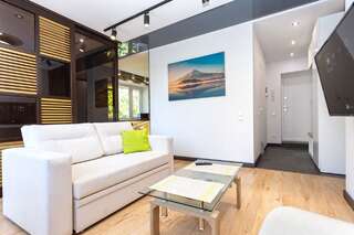 Апартаменты Apartments on Nemiga Минск Улучшенный четырехместный номер-1