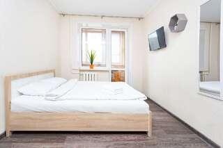 Апартаменты Apartments on Nemiga Минск Четырехместный номер с балконом-2