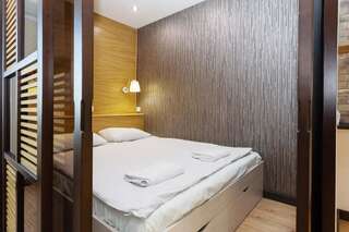 Апартаменты Apartments on Nemiga Минск Улучшенный четырехместный номер-3